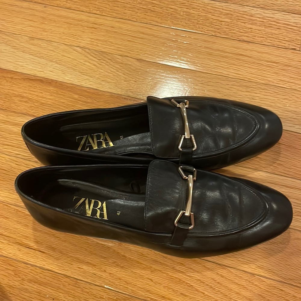 Zara black loafers with gold buckle detail